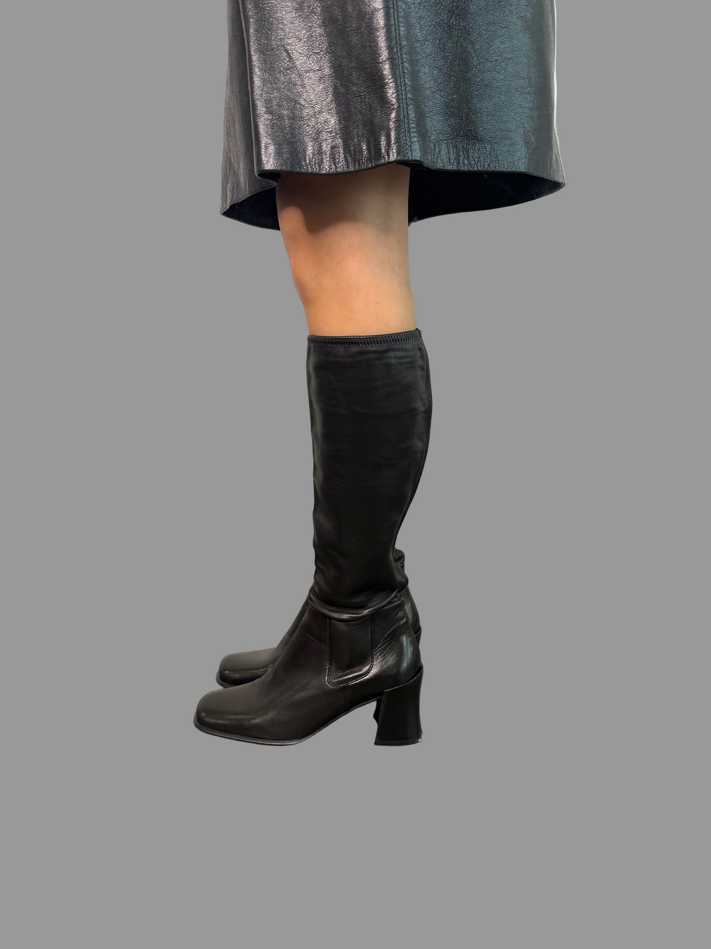 Prada black boots as seen on Carolyn Bessette Kennedy