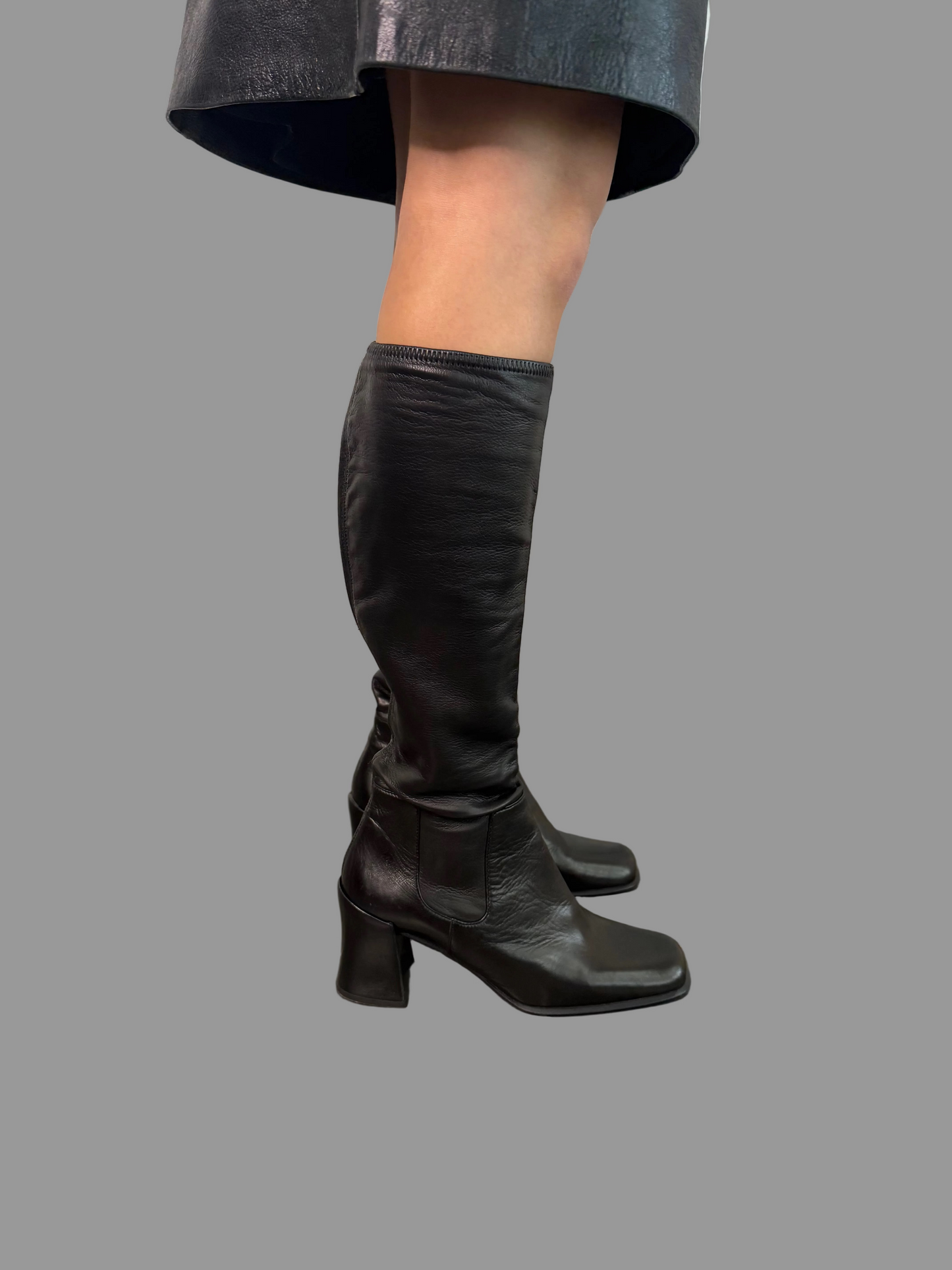 Prada black boots as seen on Carolyn Bessette Kennedy