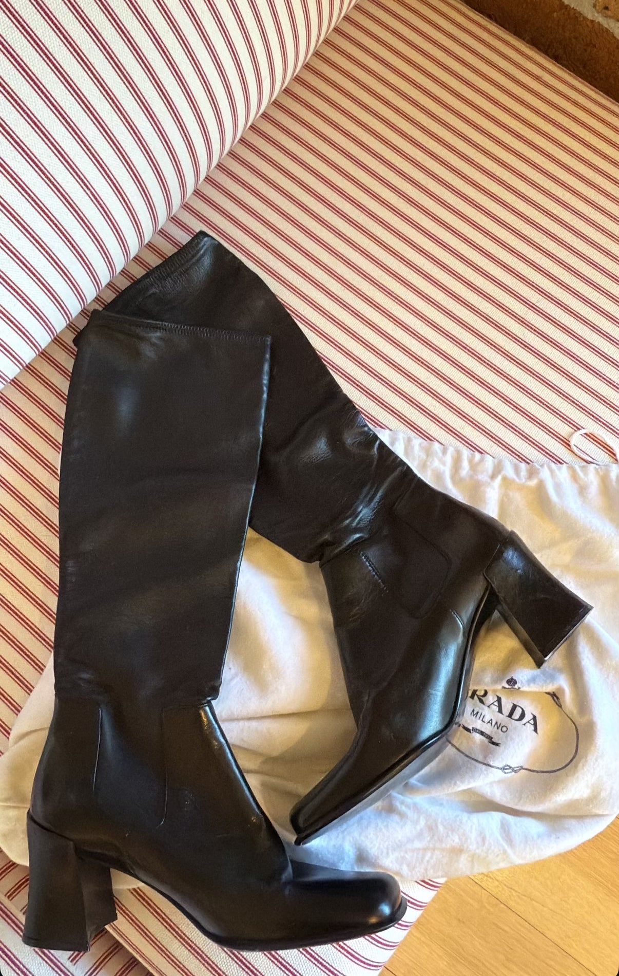 Prada black boots as seen on Carolyn Bessette Kennedy
