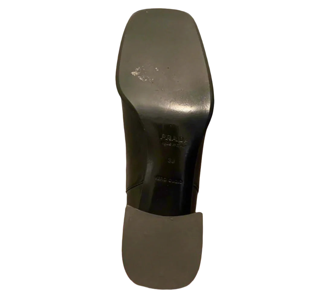 Prada black boots as seen on Carolyn Bessette Kennedy